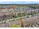 Overhead view of a townhome community featuring mature trees and convenient parking at 918 Rosalind Pl, Carmel, IN 46032