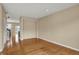 Spacious room with hardwood flooring and neutral walls, ready for customization at 918 Rosalind Pl, Carmel, IN 46032