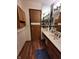 A bathroom featuring linoleum flooring, ample counter space, and mirrored storage at 10960 Marlin Rd, Indianapolis, IN 46239