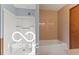 Bright bathroom featuring a shower and separate tub with attractive tile surround at 11336 Bloomfield Ct, Indianapolis, IN 46259