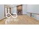 Living room featuring a brick fireplace at 11336 Bloomfield Ct, Indianapolis, IN 46259