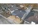 An aerial view showcasing the home's roof, yard, and proximity to neighboring houses at 1209 N Centennial St, Indianapolis, IN 46222