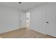 Bright bedroom with light colored flooring and a view into another room at 1209 N Centennial St, Indianapolis, IN 46222