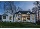 Elegant white brick home with black trim and expansive windows at 1355 Forest Hills Dr, Westfield, IN 46074