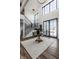 Grand foyer with high ceilings, hardwood floors, and a staircase at 1355 Forest Hills Dr, Westfield, IN 46074