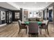 Spacious game room featuring a poker table, bar, and kitchen, perfect for entertaining at 1355 Forest Hills Dr, Westfield, IN 46074
