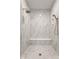 Modern tiled shower boasts a built in bench and dual shower heads at 1355 Forest Hills Dr, Westfield, IN 46074