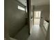 Modern bathroom features a tile shower and view to the bedroom at 14859 Amber Light Dr, Westfield, IN 46074