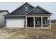 Charming single-Gathering home with a two-car garage and covered porch situated on a construction lot at 14859 Amber Light Dr, Westfield, IN 46074