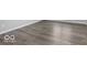 Close-up showcasing the home's hardwood flooring with a neutral color, highlighting its durability and design appeal at 14859 Amber Light Dr, Westfield, IN 46074