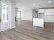 Open concept home featuring a modern kitchen, living room with fireplace and doors to the outside at 14859 Amber Light Dr, Westfield, IN 46074
