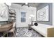 Cozy home office featuring modern artwork, a writing desk, and comfortable seating at 14859 Amber Light Dr, Westfield, IN 46074