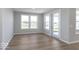 A light filled room with large windows and a glass door to the exterior at 14859 Amber Light Dr, Westfield, IN 46074