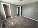 A spacious bedroom with carpet and closet at 1618 W 17Th St, Anderson, IN 46016