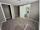 Comfortable bedroom with plush carpeting and ample closet space at 1618 W 17Th St, Anderson, IN 46016