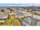 Beautiful aerial view of a suburban neighborhood with well-maintained homes and tree-lined streets on a sunny day at 16544 Gaither Ct, Westfield, IN 46074