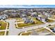 Neighborhood aerial view with manicured lawns, tree-lined streets, and varied home styles at 16544 Gaither Ct, Westfield, IN 46074