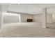 Large finished basement with ample natural light, neutral walls and plush carpeting throughout at 16544 Gaither Ct, Westfield, IN 46074
