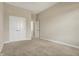 Bright bedroom featuring neutral walls, carpet flooring, and a double door closet at 16544 Gaither Ct, Westfield, IN 46074