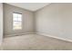 Carpeted bedroom features a large window that provides a view of the outdoors for natural light at 16544 Gaither Ct, Westfield, IN 46074