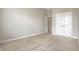 Neutral bedroom with plush carpeting, a double door closet and access to another room with an open door at 16544 Gaither Ct, Westfield, IN 46074