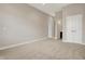 Spacious bedroom with neutral carpet, natural light and a double-door closet with access to the en-suite bathroom at 16544 Gaither Ct, Westfield, IN 46074