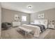 Serene bedroom with a neutral color palette, large bed, and comfortable seating at 16544 Gaither Ct, Westfield, IN 46074