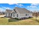 Attractive home exterior showcasing stone accents and a well-kept lawn and landscaping at 16544 Gaither Ct, Westfield, IN 46074