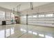 A clean, epoxy floor garage with multiple garage doors providing ample parking and storage space at 16544 Gaither Ct, Westfield, IN 46074