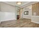 Spacious living room featuring hardwood floors and stylish architectural details at 16544 Gaither Ct, Westfield, IN 46074