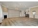 Spacious living room with hardwood floors, fireplace, and elegant lighting fixture at 16544 Gaither Ct, Westfield, IN 46074