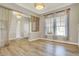 Bright living area boasts hardwood floors, neutral walls, and natural light at 16544 Gaither Ct, Westfield, IN 46074