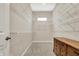 Spacious walk-in closet with shelving units, a small window, and a standalone dresser at 16544 Gaither Ct, Westfield, IN 46074