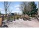 Inviting wooden deck with ample seating, perfect for outdoor dining and entertaining with a nice view at 1667 Decourcy Ct, Franklin, IN 46131