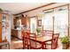 Bright dining area featuring hardwood floors, natural light, and seamlessly connected with the kitchen at 1667 Decourcy Ct, Franklin, IN 46131
