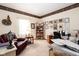 Comfortable home office with a cozy chair, built in shelving and lots of natural light at 1667 Decourcy Ct, Franklin, IN 46131