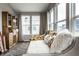 Comfortable sitting area with multiple windows, a decorative cabinet and stylish accents at 17099 Cole Evans Dr, Noblesville, IN 46060