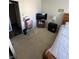 Bedroom with a wood-framed bed, light walls, and carpet at , Indianapolis, IN 46219
