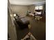 Spacious living room with carpeted floors and neutral-toned walls at , Indianapolis, IN 46219
