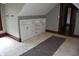 Attic area with custom built-in cabinets and hardwood trim at 189 S Jefferson St, Martinsville, IN 46151