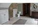 Bathroom with marble shower, custom vanity, and stylish tile flooring at 189 S Jefferson St, Martinsville, IN 46151