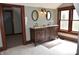 This bathroom has double sinks, granite counters, custom vanity, with natural light at 189 S Jefferson St, Martinsville, IN 46151
