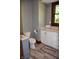 A bathroom features a laundry room rug and bright counter at 189 S Jefferson St, Martinsville, IN 46151