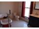 Bathroom featuring a clawfoot tub, black and white floors and a stylish vanity at 189 S Jefferson St, Martinsville, IN 46151