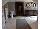Large bathroom featuring a double sink vanity and an open entrance to a shower at 189 S Jefferson St, Martinsville, IN 46151