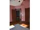 Cozy bedroom with original wood doors, trim and decorative molding and warm colors at 189 S Jefferson St, Martinsville, IN 46151