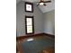 Bright bedroom featuring beautiful hardwood floors and a decorative window at 189 S Jefferson St, Martinsville, IN 46151