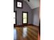 A beautiful bedroom with charming windows, vaulted ceilings, and hardwood floors at 189 S Jefferson St, Martinsville, IN 46151