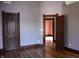 Bedroom featuring beautiful hard wood floors, decorative trim, and wood doors at 189 S Jefferson St, Martinsville, IN 46151