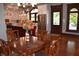 Dining room with hardwood floors and a view of the kitchen through the archway at 189 S Jefferson St, Martinsville, IN 46151